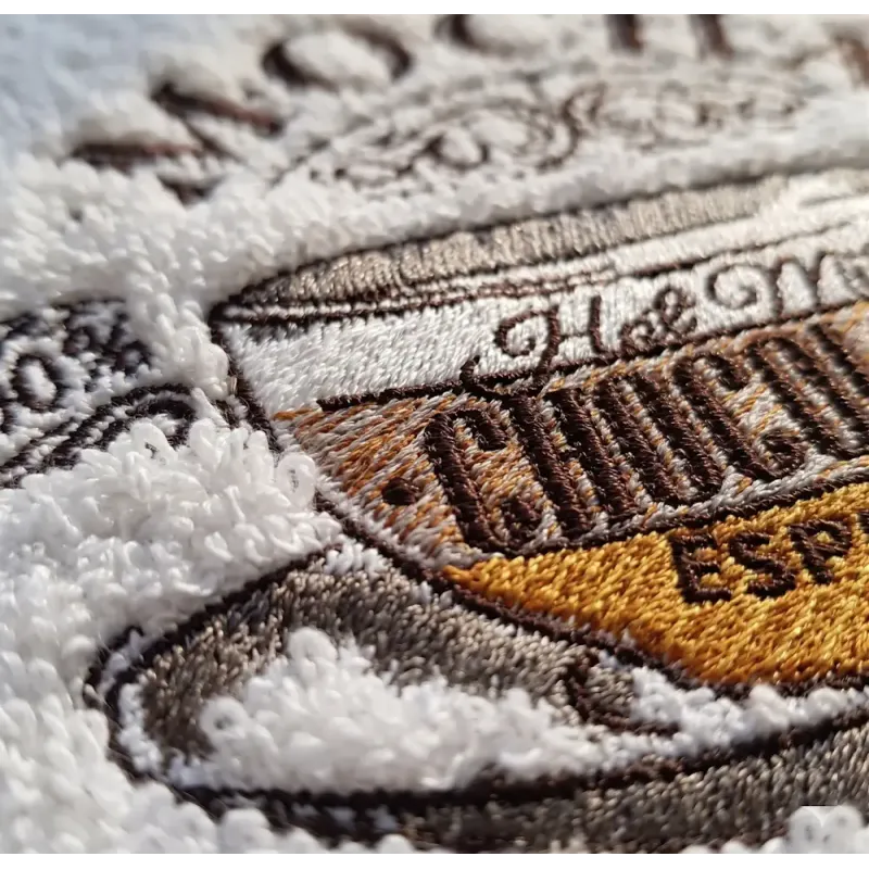 Cup of mocha embroidery design preview showing stitched coffee cup pattern