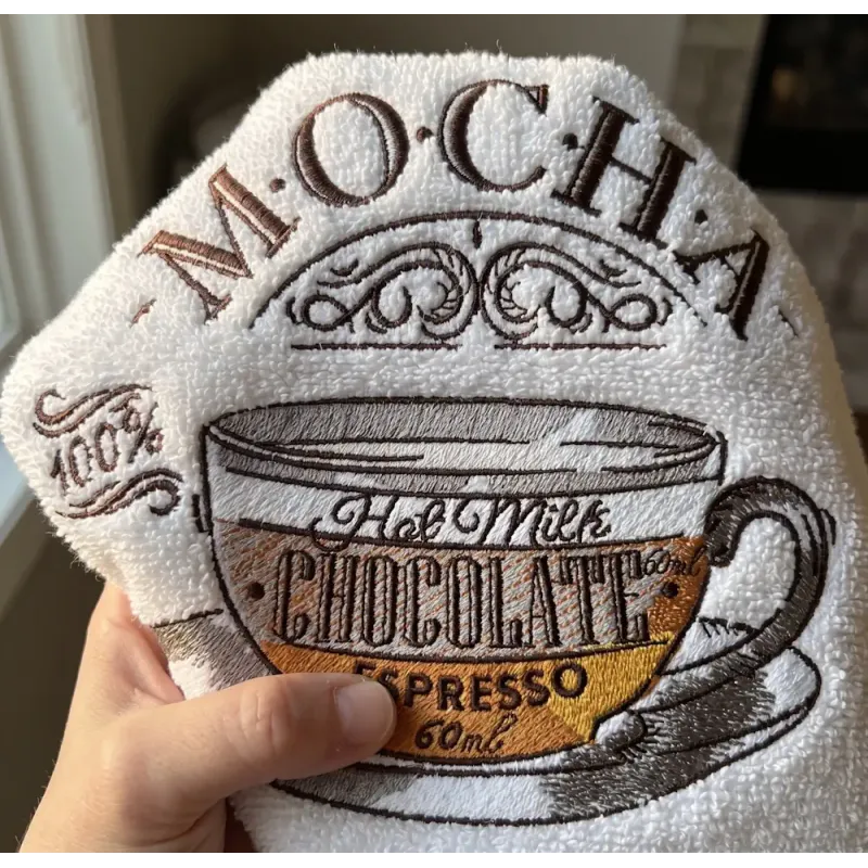 Cup of mocha embroidery design with detailed stitching pattern for hoops