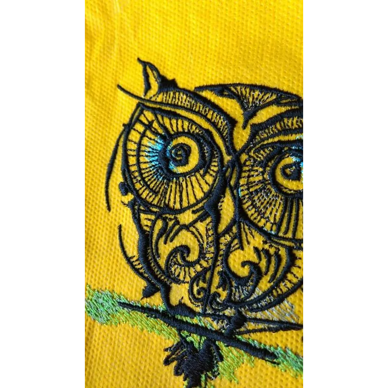 Strange owl 12 embroidery design closeup showing detailed stitching pattern