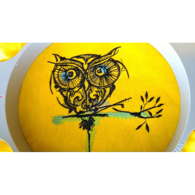 Strange owl 12 embroidery design closeup showing detailed stitching pattern