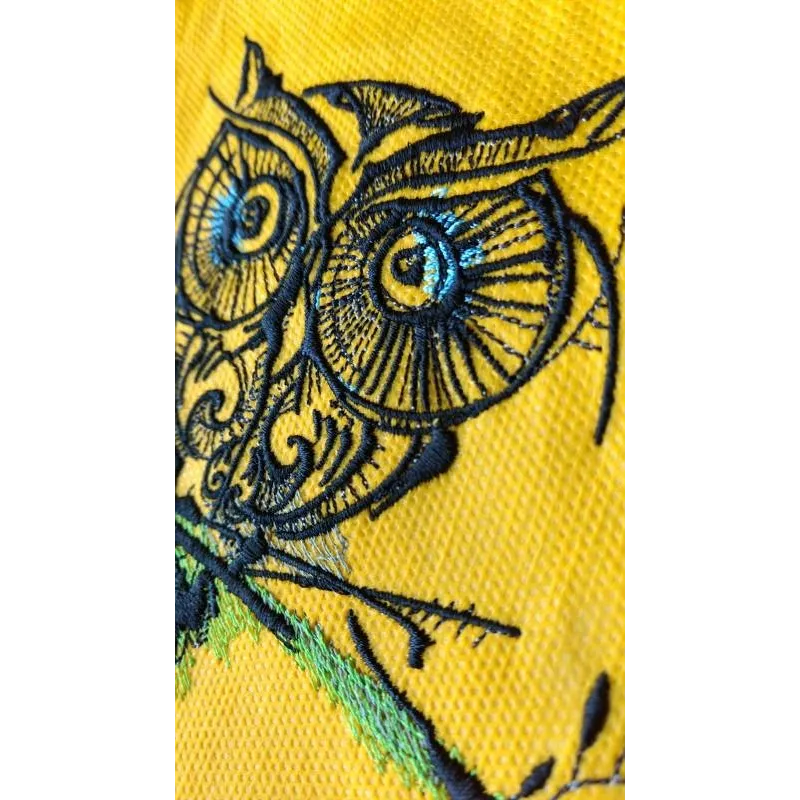 Strange owl 12 embroidery design closeup showing detailed stitching pattern