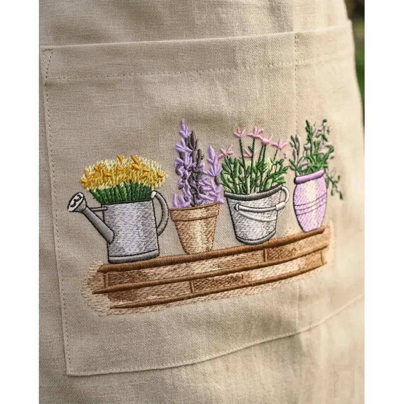 Flower pots on wooden bench embroidery design preview showing stitched floral motifs