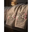 Mr & Mrs embroidery design preview showing romantic text stitching pattern