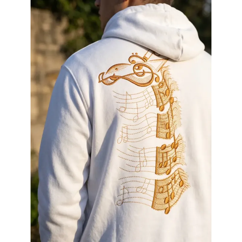 Music giraffe embroidery design mockup showing detailed stitching pattern