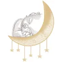 A baby peacefully sleeping on a soft surface featuring a golden crescent embroidery design.