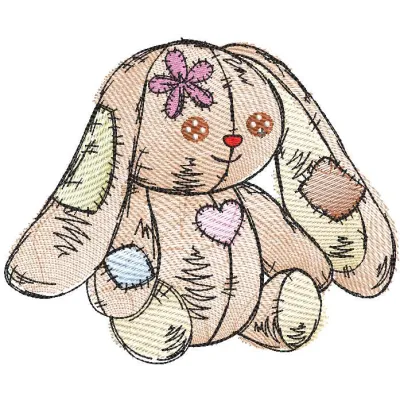 Rabbit toy tattered embroidery design preview showcasing intricate details and vibrant stitching.