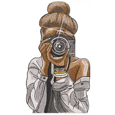 Embroidery design of a tanned girl photographer capturing moments, ideal for home and hobby projects.