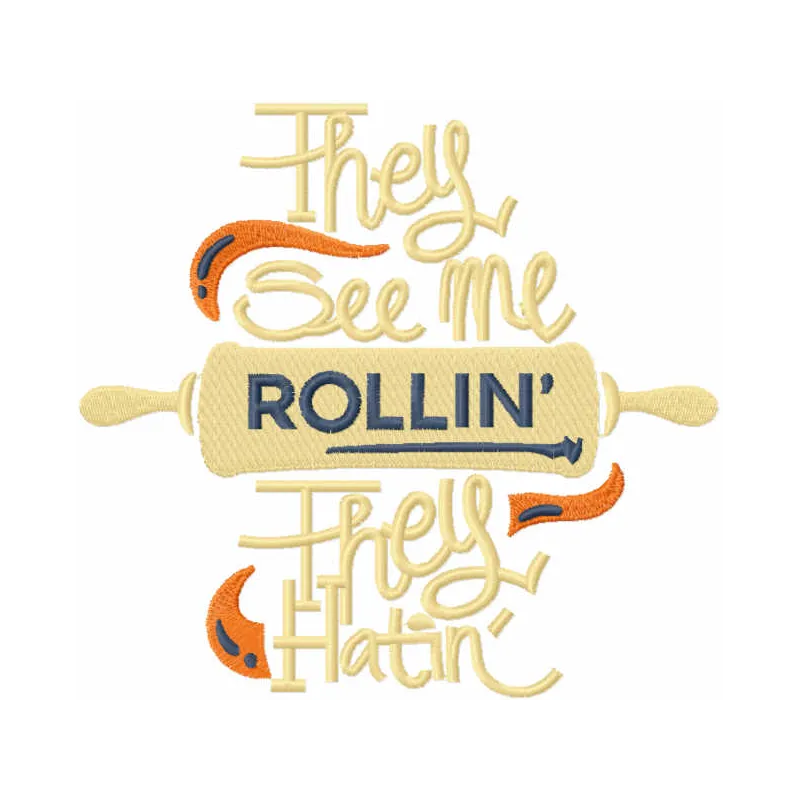They see me rollin they hatin embroidery design showcased on a kitchen towel, perfect for cooking enthusiasts.