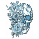 Skull among flowers embroidery design featuring intricate floral details surrounding a skull motif.