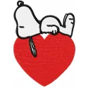 Embroidery design featuring a sleeping Snoopy surrounded by a heart, perfect for stitching on t-shirts and pillows.