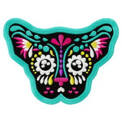 Decorated small dog muzzle embroidery design showcasing intricate stitching patterns for pet enthusiasts.