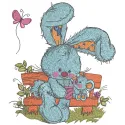 Embroidery design featuring two bunnies sitting on a bench, perfect for adding charm to t-shirts or pillows.