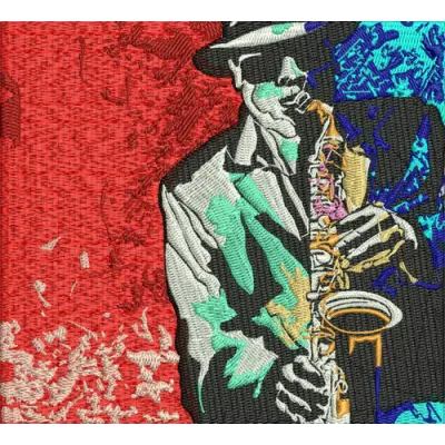 Saxophonist embroidery design featuring a detailed musician playing the saxophone, perfect for music-themed projects.