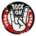 Rock on embroidery design featuring musical elements, perfect for stitching on t-shirts and hoodies.